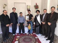 دیدار شهردار ،رئیس شورای شهر ،امام جمعه شهر و رییس بنیاد شهید شهرستان با خانواده شهدا